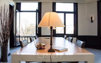 Impression meeting room with black chairs