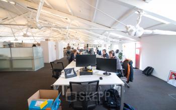 working desks in open shared space