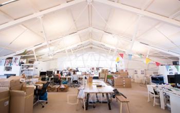 Many working places in bright open office space