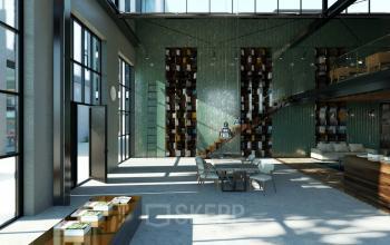 Moderne kantoorruimte te huur in Amsterdam Noord met hoge plafonds, veel natuurlijk licht en stijlvolle meubels. Ideaal voor werkruimtes met een open indeling en creatieve sfeer.