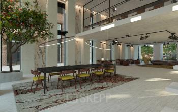 Moderne kantoorruimte huren in Amsterdam Noord met stijlvolle inrichting en veel daglicht. Grote tafels en groene planten zorgen voor een inspirerende werkplek. Ideaal voor verschillende zakelijke activiteiten.
