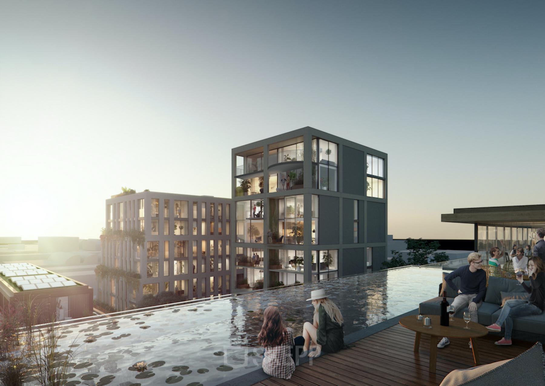 Moderne kantoorpanden in Amsterdam Noord met een ruim dakterras en uitzicht over de stad, mensen genieten van de buitenlucht naast het water.