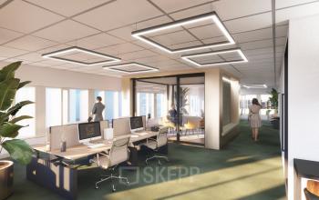 Moderne kantoorruimte huren op Herikerbergweg 290 in Amsterdam Zuid-Oost met strakke werkplekken en personeelsinteractie bij de bureaus.