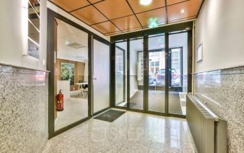 entrance office building amsterdam glass doors