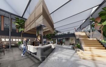 Moderne kantoorruimte huren in Amsterdam Zuidas op Jachthavenweg 109-A met centrale open ruimte, koffiestand, zitplaatsen, en trappen.
