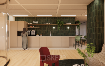 Moderne kantoorruimte huren op Beethovenstraat 503 in Amsterdam Zuidas met groene tegelwand, koffiezetapparaat en zitgelegenheid. Gezellige sfeer voor informele bijeenkomsten.