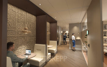 Moderne werkruimte in Amsterdam Zuidas met weinig licht, stijlvolle houten panelen en ingebouwde zitplekken. Meerdere mensen zijn bezig met zakelijke activiteiten, zoals werken op laptops en overleg.