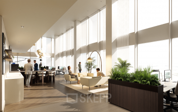 Moderne kantoorruimte in Amsterdam Zuidas met grote ramen, stijlvolle meubels en mensen in gesprek. Ideaal om te huren met veel licht en groen. Gelegen op Claude Debussylaan 80-134.