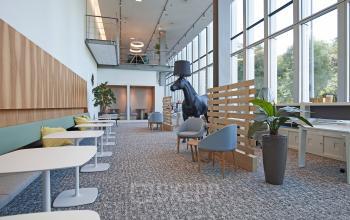 loungeruimte sociaalhart meubilair kantoorpand kantoorgebouw Zuidas