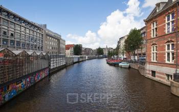 buitenaanzicht kantoorpand Amsterdam Singel omgeving ramen uitzicht