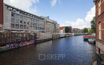 buitenkant kantoor Amsterdam Singel omgeving ramen uitzicht