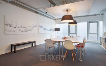 office space white table and chairs