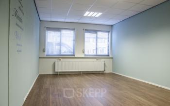 empty office space two windows heating