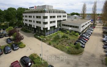 office space parking spots white building