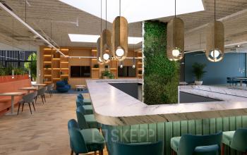 Moderne kantoorruimte aan Essebaan 63-69 in Capelle aan den IJssel met stijlvolle bar, veel natuurlijke lichtinval en comfortabele zitplaatsen. Ideaal om te huren voor inspirerend werk of informele vergaderingen.
