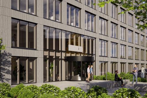 Exterieur van kantoorpand aan Hambakenwetering 1-kr in Den Bosch, met moderne gevel en glazen entree. Mensen voeren zakelijke gesprekken buiten het gebouw, een uitnodigende locatie voor kantoorruimte huren.