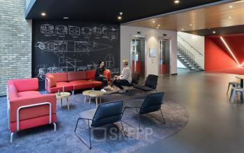 chalkboard meeting place couch chairs