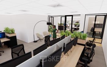 Kantoor aan de Brandweerstraat 20-30 in Enschede met moderne werkplekken. Personen zijn bezig met overleg en werkzaamheden. Ideaal voor bedrijven die kantoorruimte willen huren met open werkplekken en vergaderzalen.