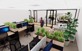 Interieur van een moderne kantoorpand op Brandweerstraat 20-30 in Enschede, met werkplekken, planten en mensen in zakelijke activiteiten.