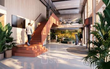 Moderne kantoorlobby aan de Moutlaan 1-23 in Enschede met planten, een trap en een grote muurschildering. Zakelijke personen voeren activiteiten uit, zoals overleg aan tafels. Kantoorruimte huren met stijl.