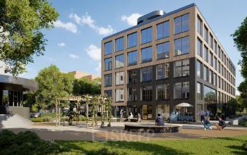 Modern kantoorpand op Moutlaan 1-23 in Enschede, met mensen die buiten zitten en werken, omringd door groen. Ideaal voor wie kantoorruimte wil huren in een levendige omgeving.