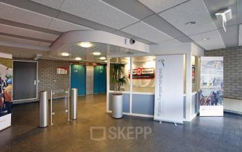 entrance office building reception desk elevator