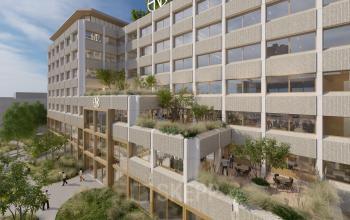 Moderne kantoren in een kantoorpand op Marten Meesweg 101, Rotterdam Alexander, met groene gevels en ruime ramen.