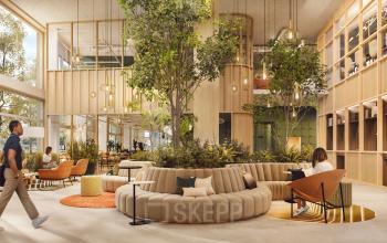 Moderne en vriendelijk ogende kantoorruimte in Rotterdam Alexander met veel groen en comfortabele zitplaatsen voor werk en overleg.