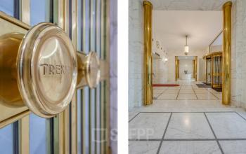 Ingang van kantoorpand Blaak 34 in Rotterdam Centrum met marmeren vloer en gouden accenten.