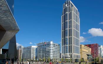 Kantoorpand op Weena 690 in Rotterdam Centrum met heldere lucht op de achtergrond. Ideaal voor kantoorruimte huren.