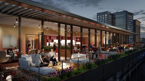 Gezellige, moderne kantoorruimte op Hoogstraat 185, Rotterdam Centrum, met mensen in een lounge met een panoramisch uitzicht. Ideaal voor vergaderingen en netwerken met de mogelijkheid om kantoorruimte te huren.