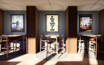 Stijlvolle werkruimte in kantoorpand aan Coolsingel 139, Rotterdam Centrum, met kleine tafels en bijpassende stoelen, geschilderde wanden en kunstwerken, ideaal voor kantoorruimte huren.