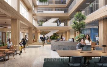Moderne kantoorruimte op Coolsingel 75, Rotterdam Centrum met meerdere verdiepingen. Mensen werken en ontspannen in een ruime en groene omgeving met houten elementen.