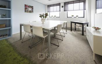 white table and chairs windows storageroom