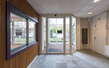 entrance office building tilburg wooden wall