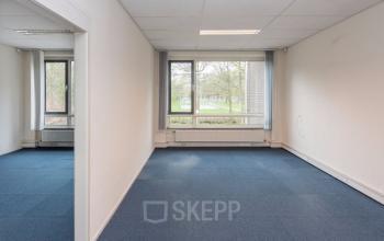 office building tilburg blue carpet