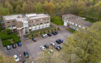 office building tilburg with parking spots