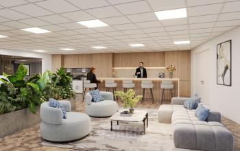 Moderne kantoorruimte in Utrecht Rijnsweerd met stijlvolle zithoek, bar en groene planten. Mensen voeren zakelijke gesprekken en werkzaamheden uit. De ruimte nodigt uit om te huren.