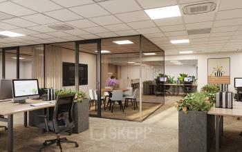 Moderne kantoorruimte huren op Newtonlaan 115 in Utrecht Rijnsweerd, met een open indeling en glazen vergaderruimte, groene planten en kantoormeubilair, ideaal voor een productieve werkdag.
