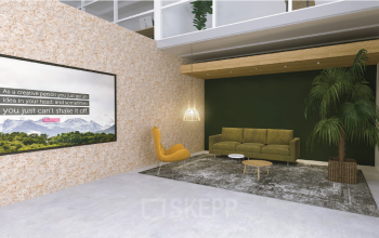 Moderne kantoorlounge in Utrecht Zuid met stijlvolle zitbank, fauteuil en planten. Geschikt voor kantoorruimte huren in kantoorpand aan de Eendrachtlaan 100-260.