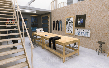 Industriële kantoorruimte in Utrecht Zuid, Eendrachtlaan 100-260, met een houten werkbank, krukken en naaimaterialen, geschikt voor creatieve werkomgeving en kantoorruimte huren.