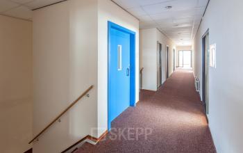 hallway blue door elevator office space zutphen